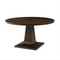 Mid-century round dining table, full view, angled.