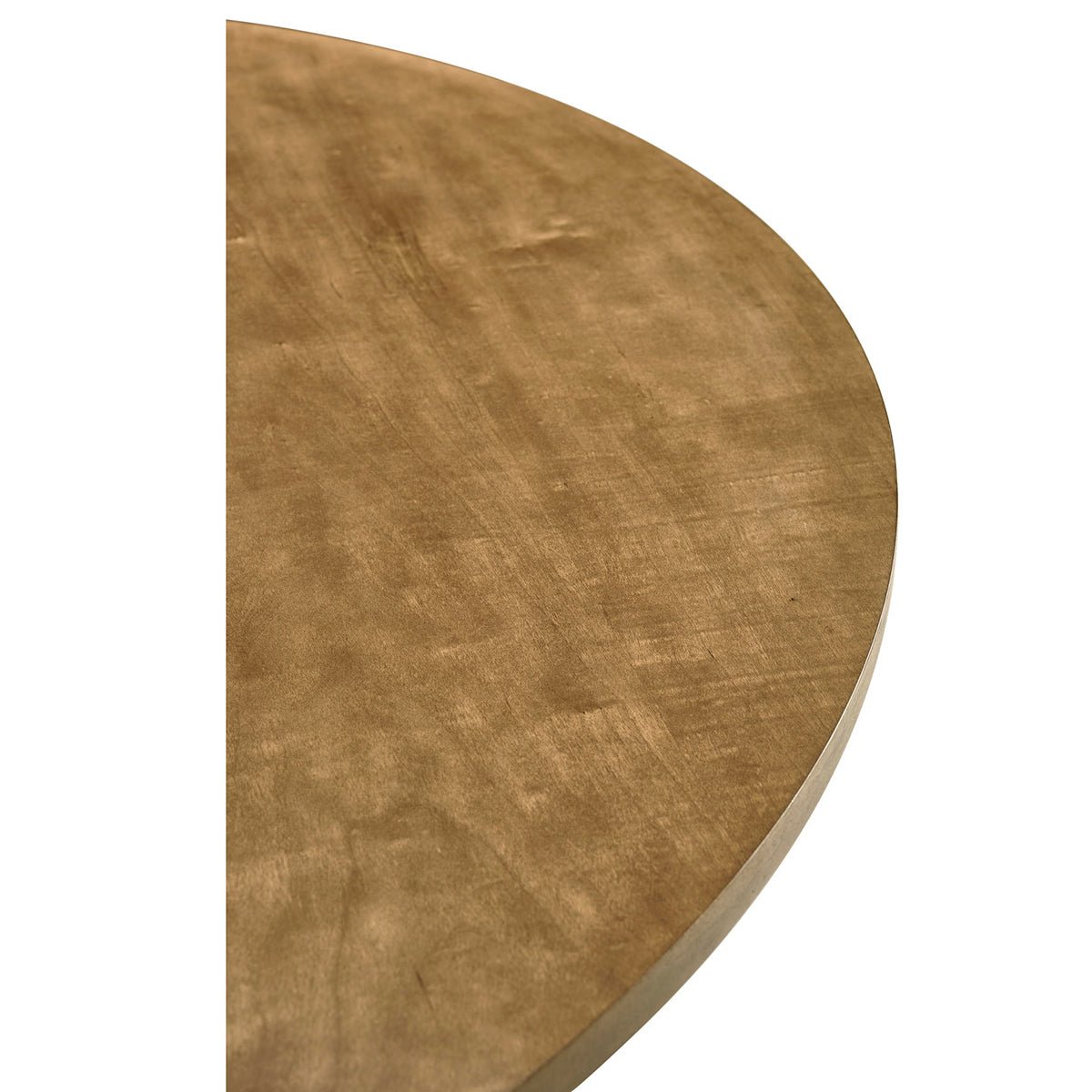 Close-up of table surface texture, round wood finish.