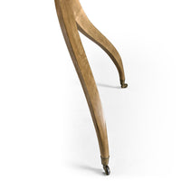 Close-up of table leg, wheel accessory detail shown.