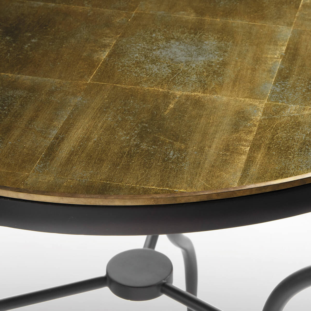 Close-up of eglomisé tabletop finish on side table.