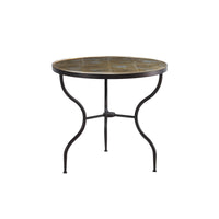 Metal-legged round side table against white background.