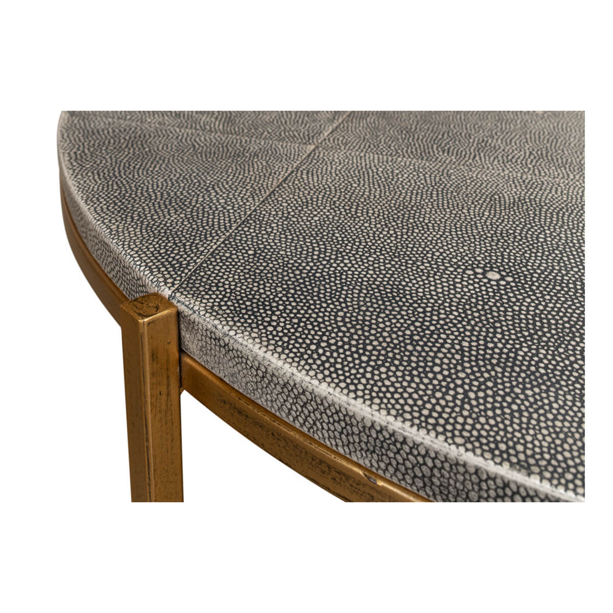 Round leather cocktail table, close-up corner, fine details.