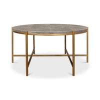 Round leather cocktail table, straight side view, metal legs.
