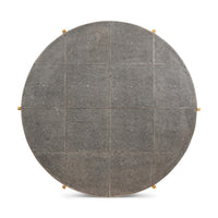 Round leather cocktail table, detailed top view, grid pattern.