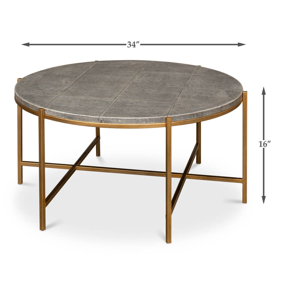 Round leather cocktail table, dimensions shown, modern design.