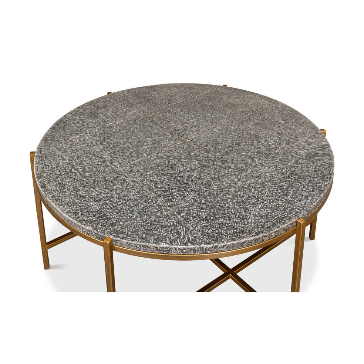Round leather cocktail table, top-down view, textured surface.