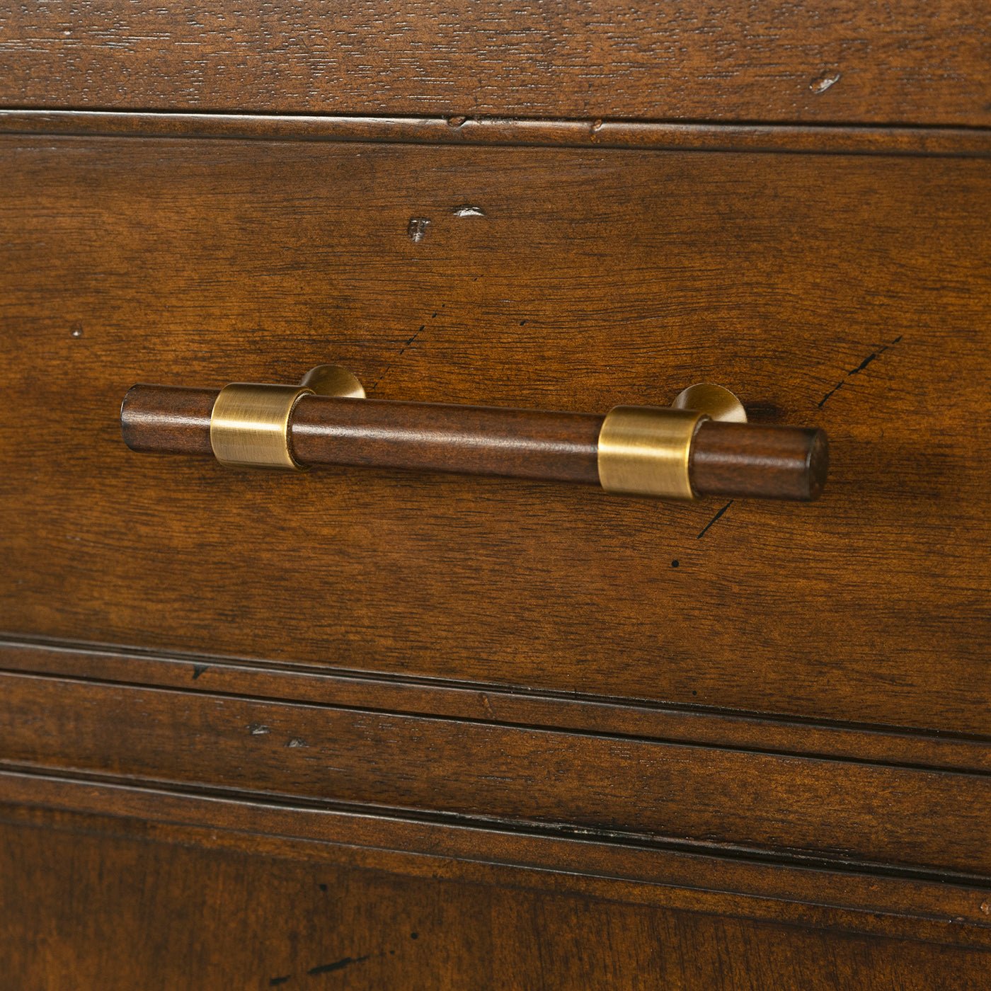 Close-up of mid century sideboard drawer handle.