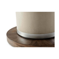 Dining table base with metal accent close-up.