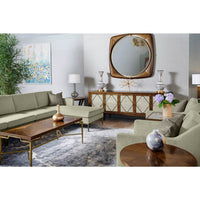 Living room scene with mid-century coffee table and furniture.