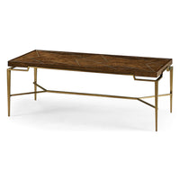 Mid-century coffee table, angled view with brass legs.