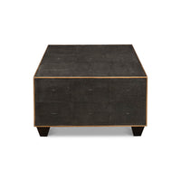 Side view of mid-century style leather cocktail table.