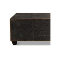 Front side detail of leather cocktail table and legs.