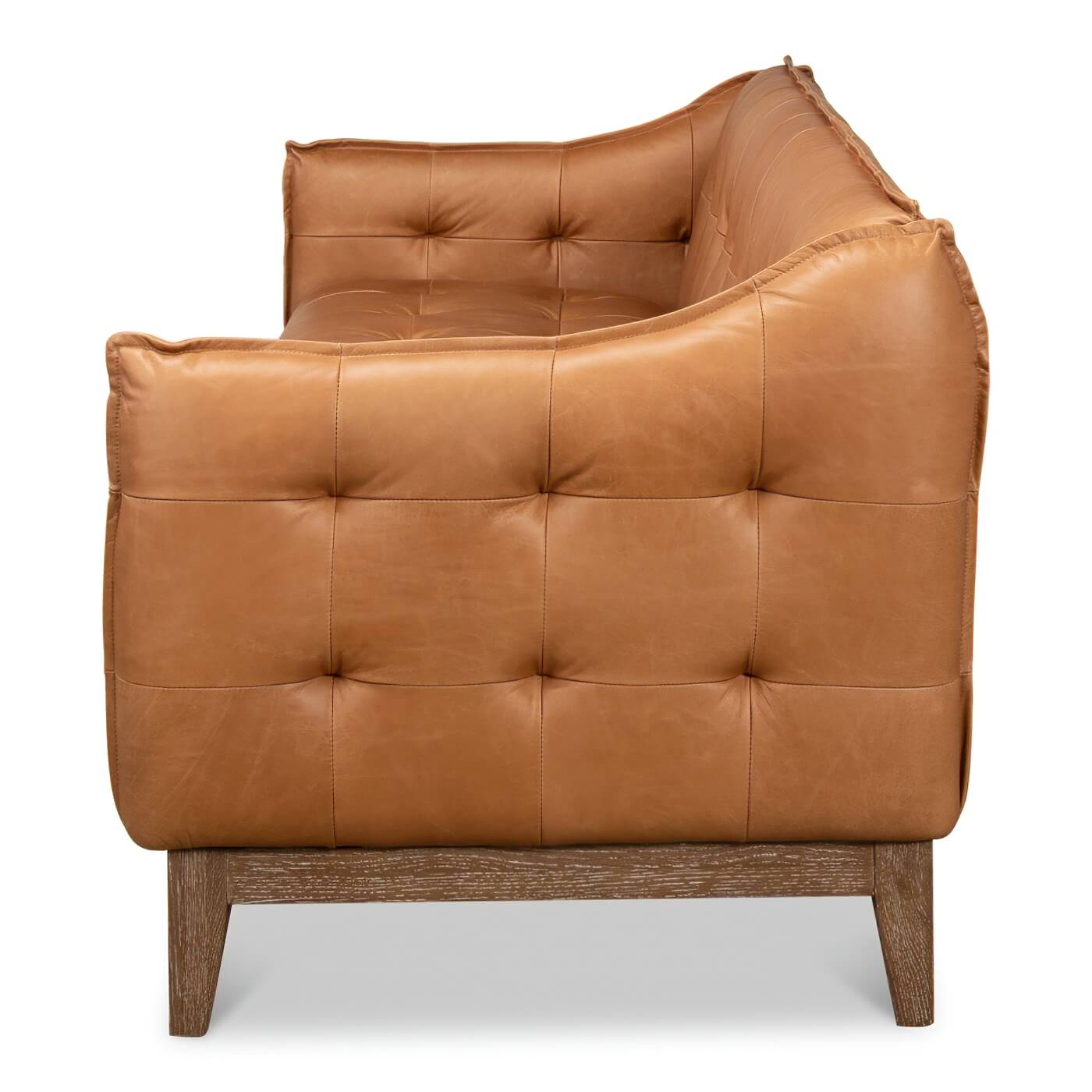 Side view of mid-century leather sofa.