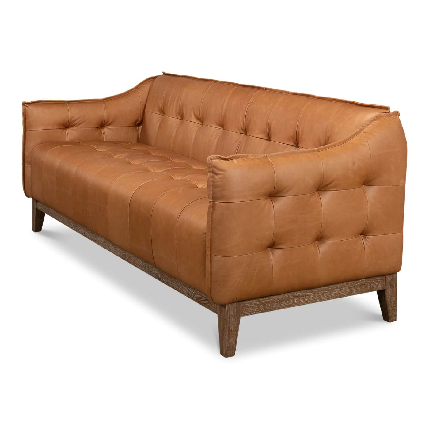 Mid-century leather sofa angled side view.