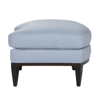 Side view of blue ottoman, mid-century style design