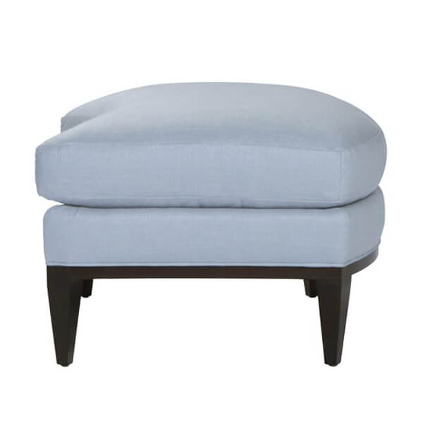 Side view of blue ottoman, mid-century style design
