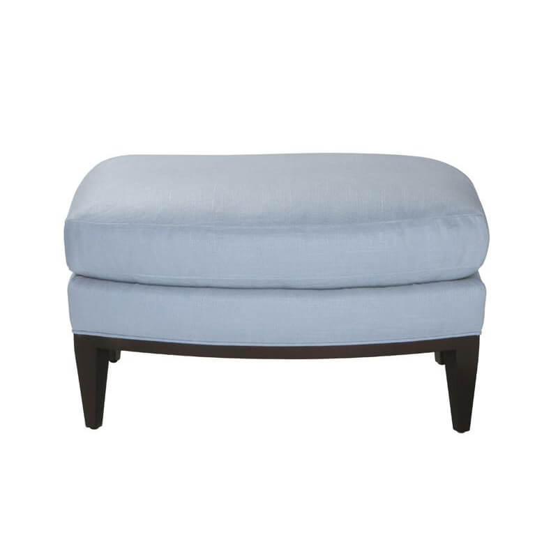 Front view of mid-century ottoman, light blue fabric