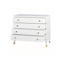 White mid-century style dresser with drawers partially open.