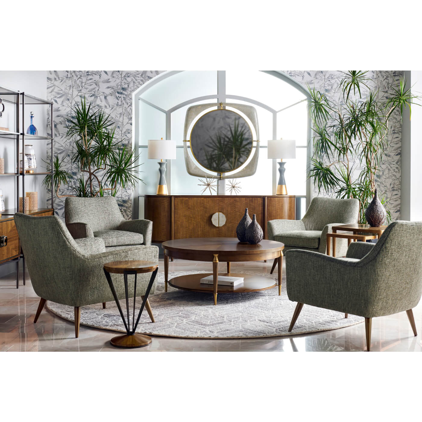 Styled living room with mid-century round coffee table.