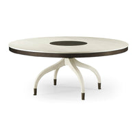 Mid-century round dining table, angled view.