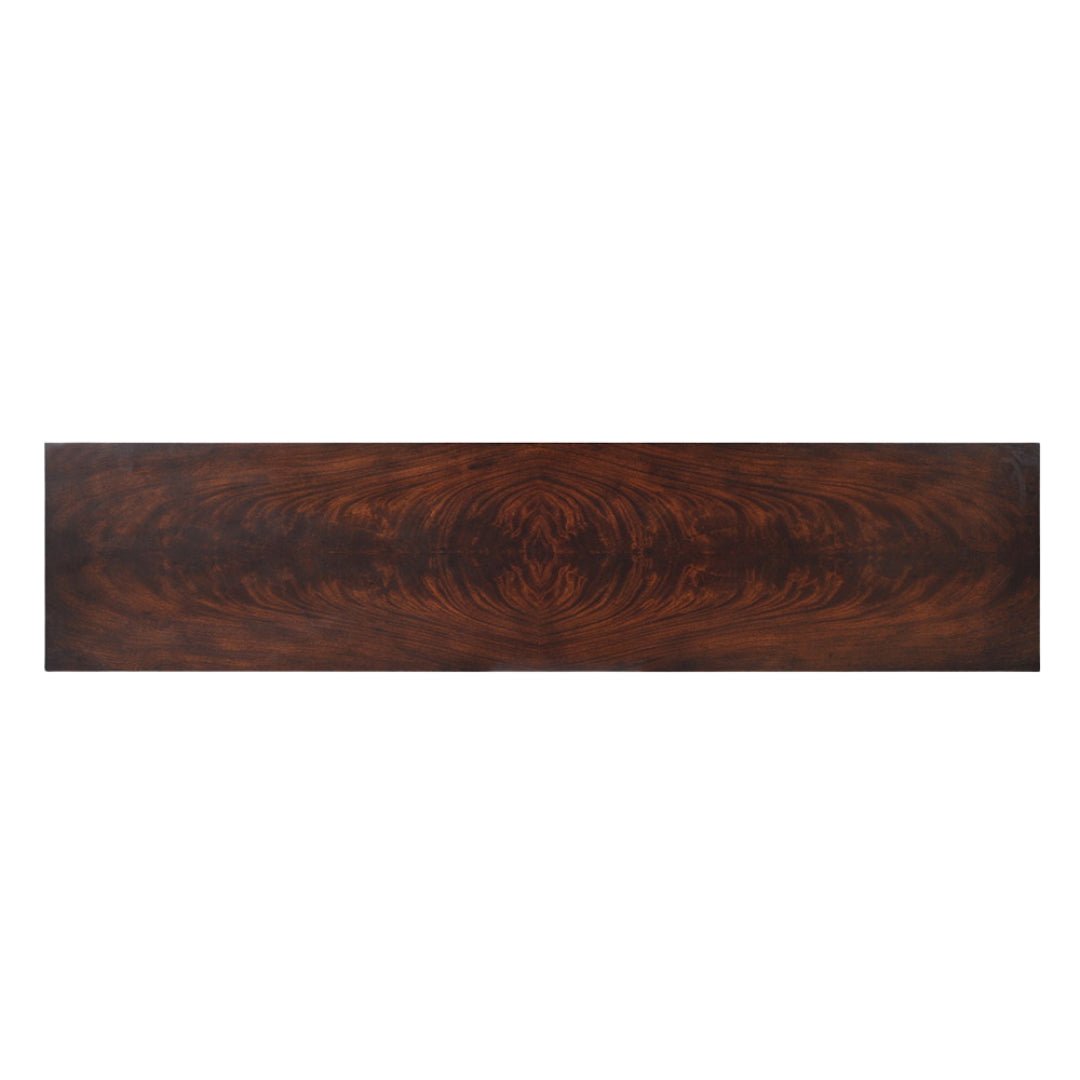 Top view of sideboard, rich wood grain pattern.
