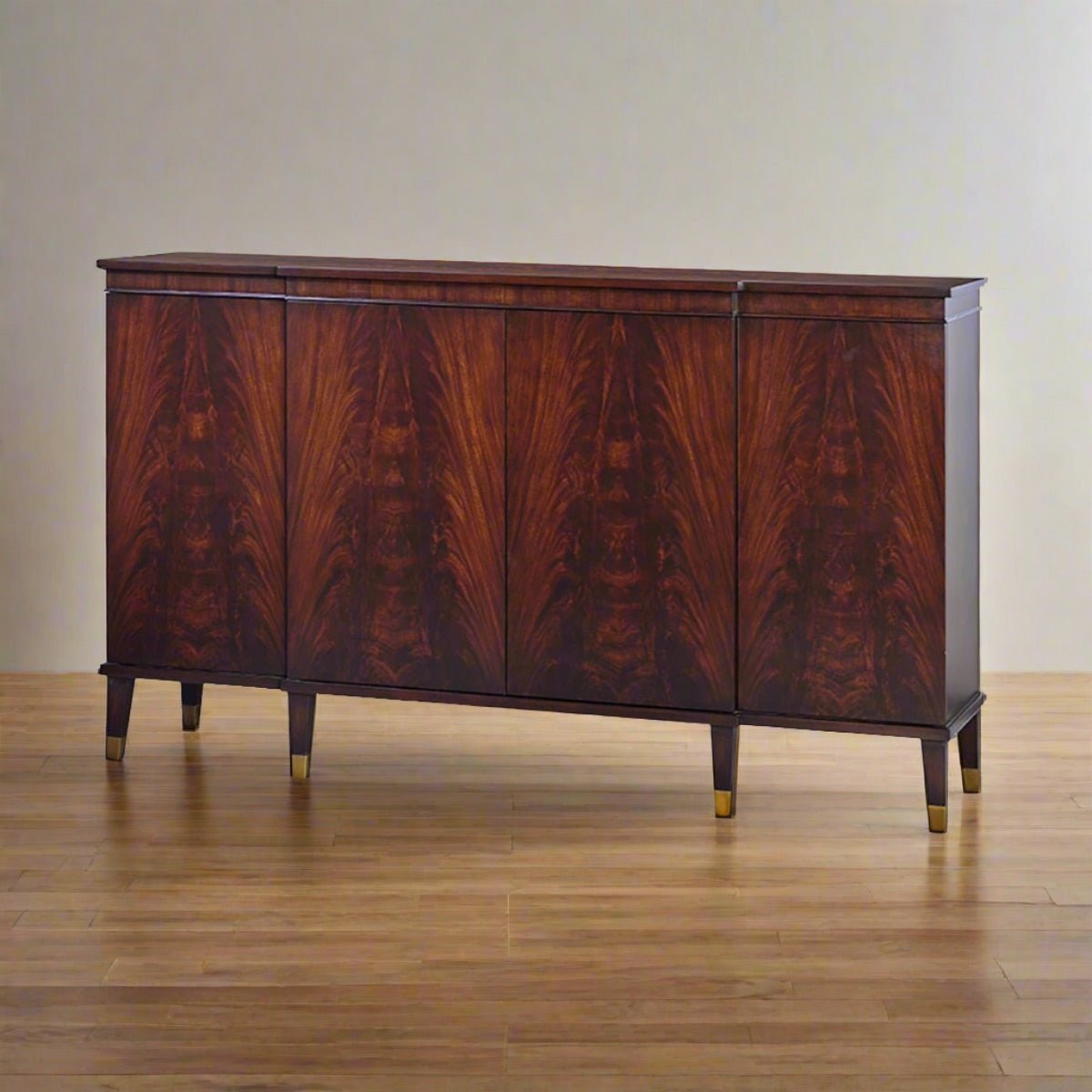 Sideboard on wooden floor, mid-century design, front view.
