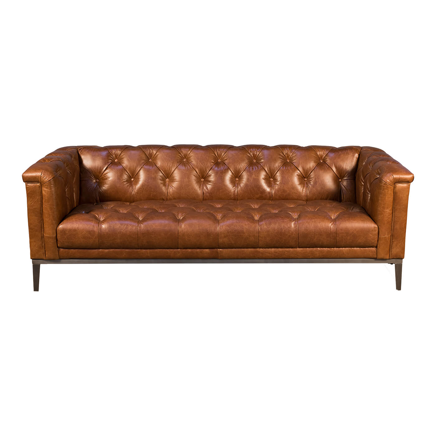 Front view of brown leather tufted sofa, mid-century style.