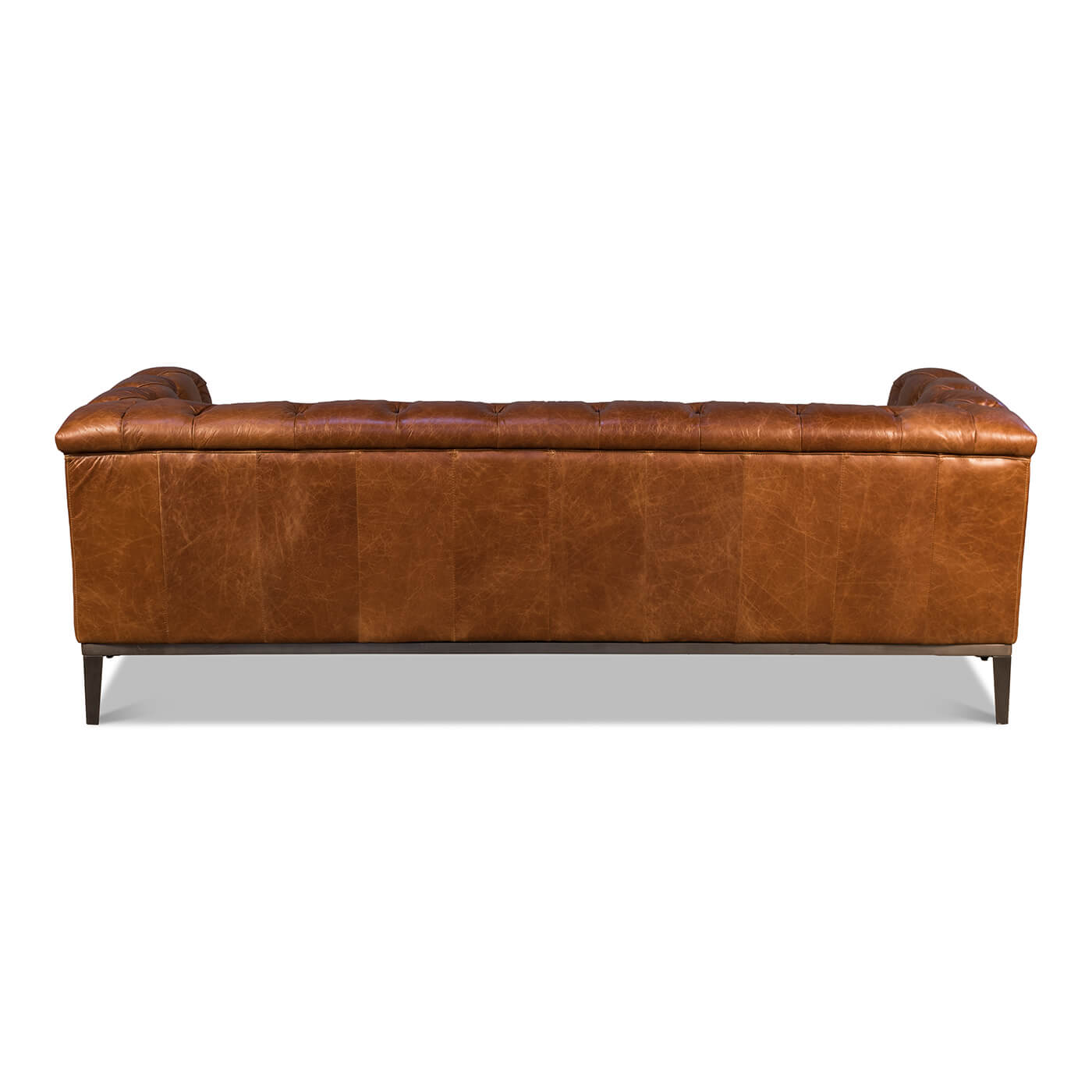 Back view of brown leather tufted sofa, sleek design.