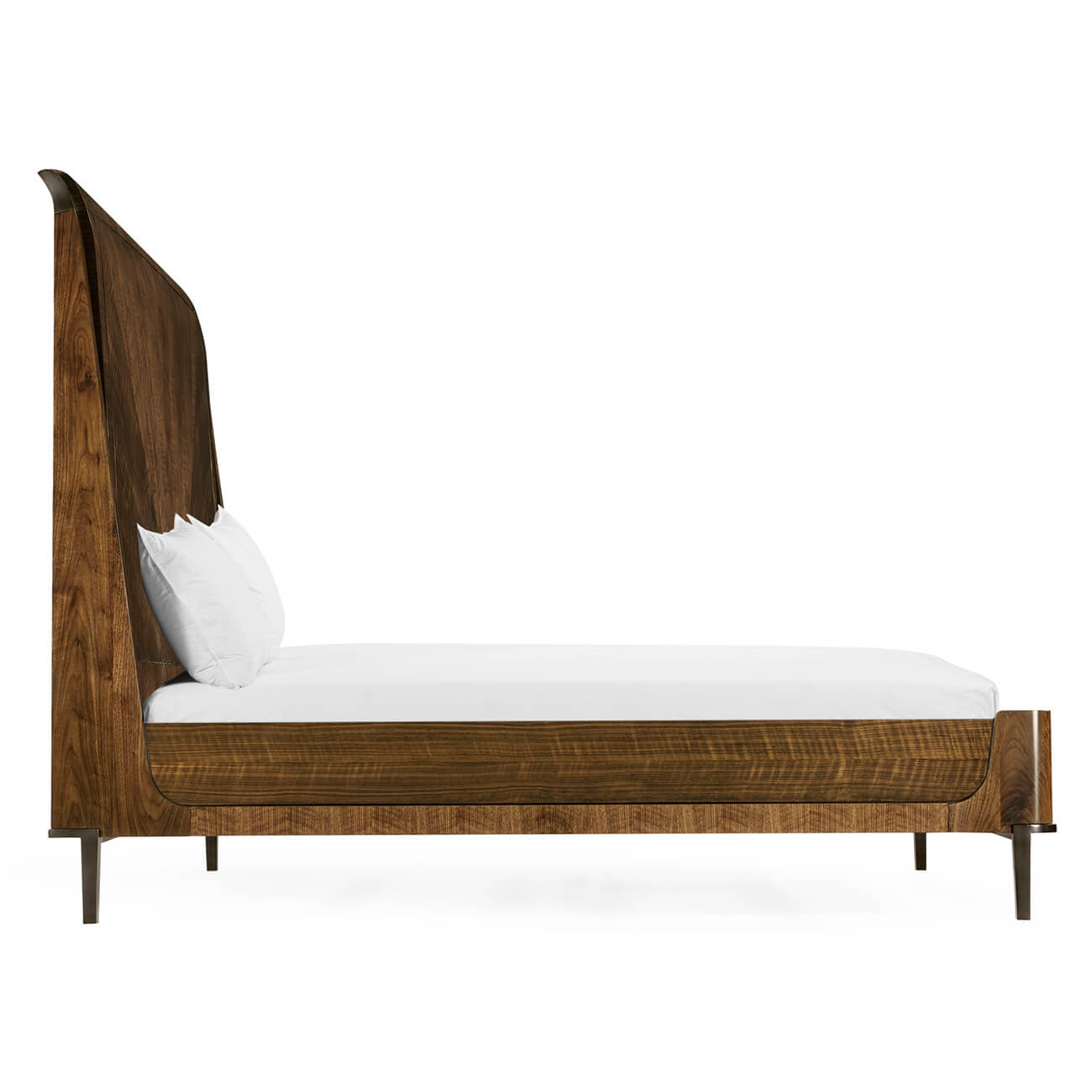 Side profile of mid-century king walnut bed, headboard visible.