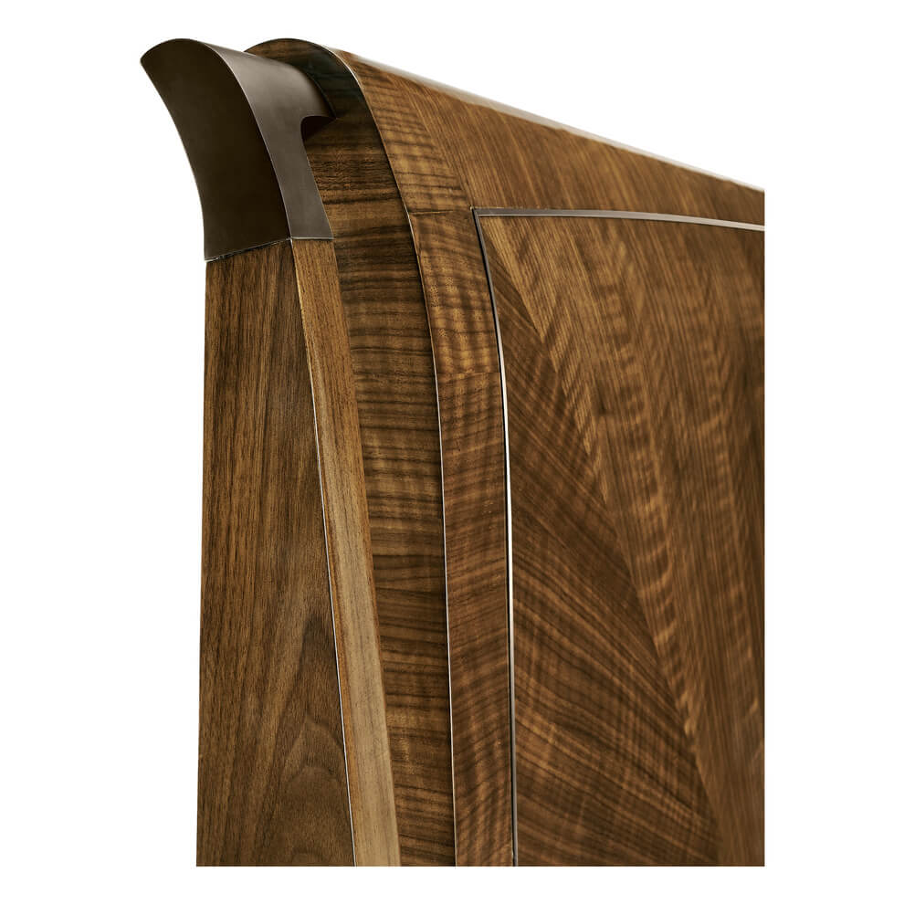 Close-up of mid-century walnut bed headboard's corner design.