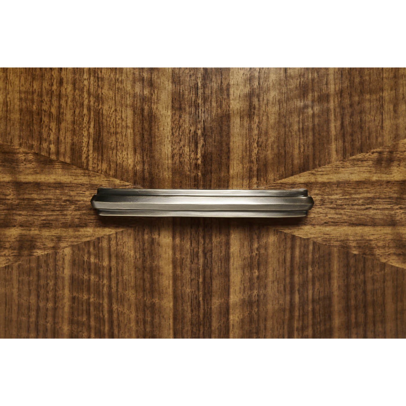 Close-up of walnut nightstand handle, mid century design.