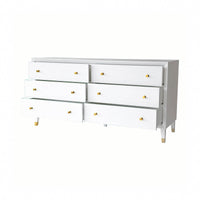 White dresser; six open drawers, gold knobs, mid-century design.