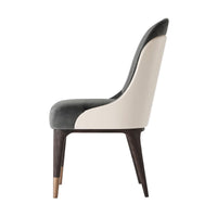 Mid-century upholstered dining chair, side profile.
