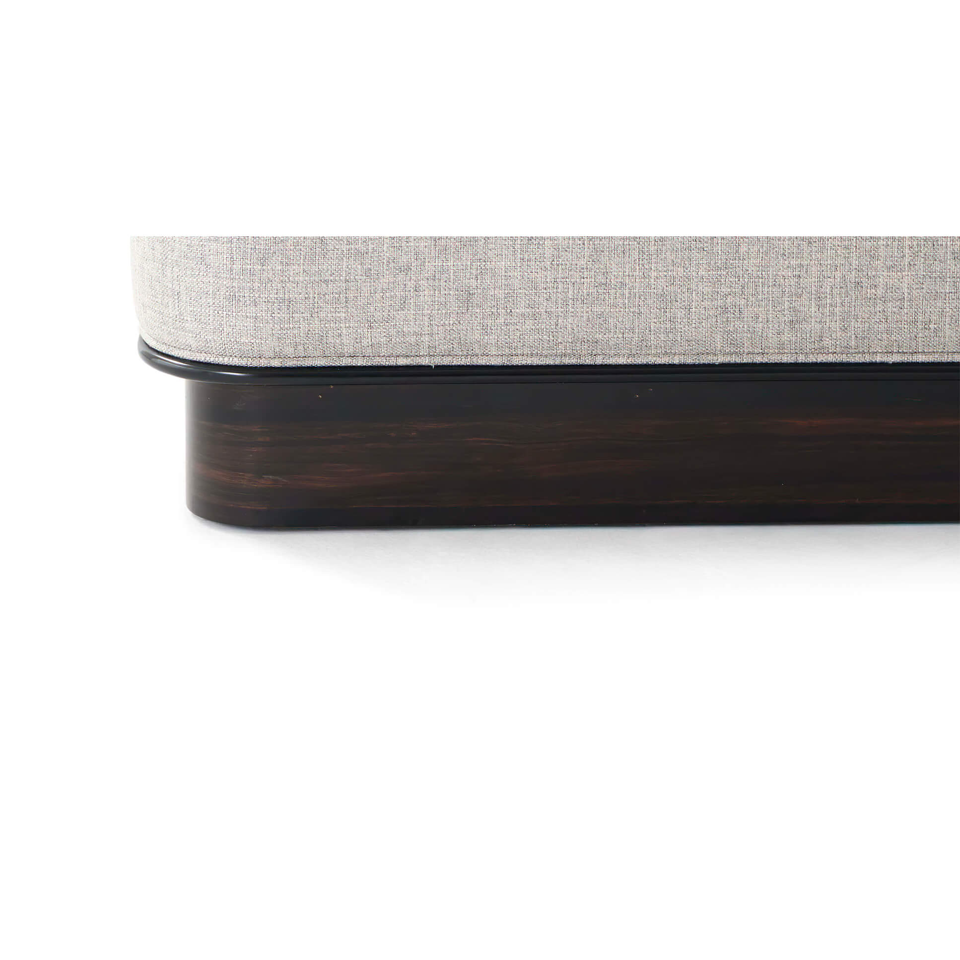 Bed base close-up showing dark wood finish.