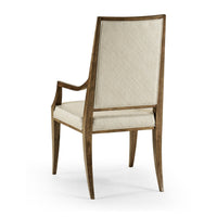 Back view of mid-century walnut dining armchair.