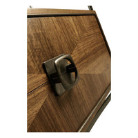 Close-up of etagere cabinet handle detail.