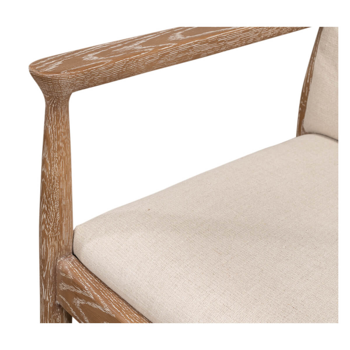 Mid-century whitewash armchair, armrest and seat detail.