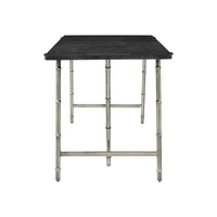 Side view of mid-century writing table metal legs.