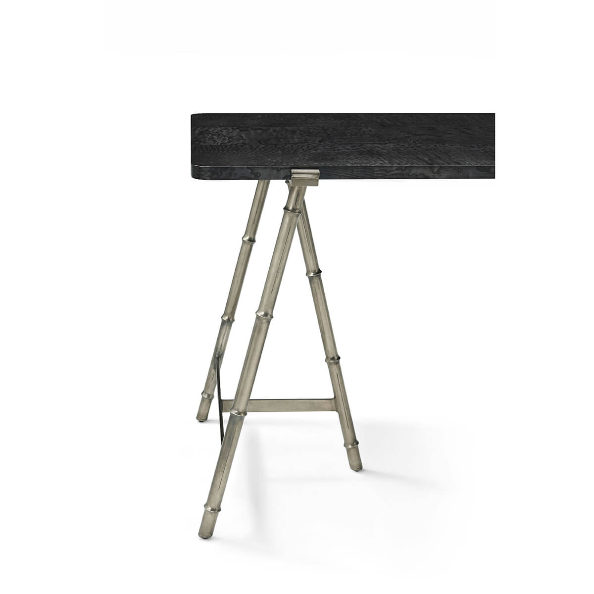 Close-up of writing table leg design and edge detail.