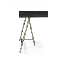 Close-up of writing table leg design and edge detail.