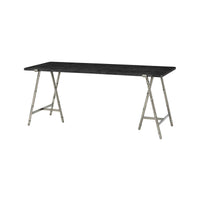 Mid-century writing table with metal legs, angled view.