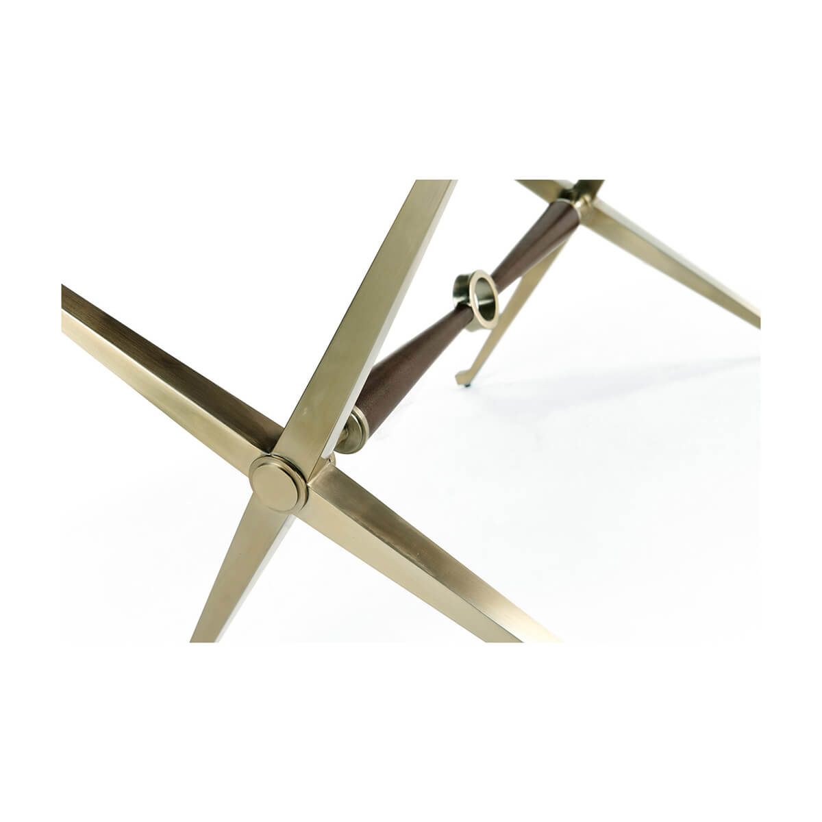 Close-up of mid-century X stool metal frame detail.