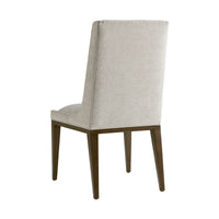 Midcentury dining chair back view, beige upholstery.