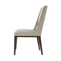 Side profile of midcentury upholstered dining chair.