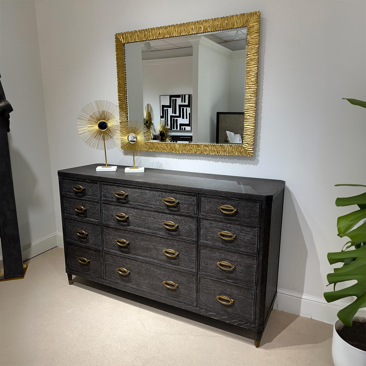 Styled Midnight Modern Dresser with mirror and decor.