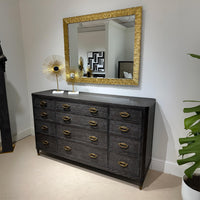 Styled Midnight Modern Dresser with mirror and decor.