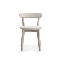 Minimal oak dining chair, direct front view.