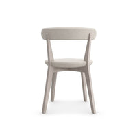 Minimal oak dining chair, direct back view.