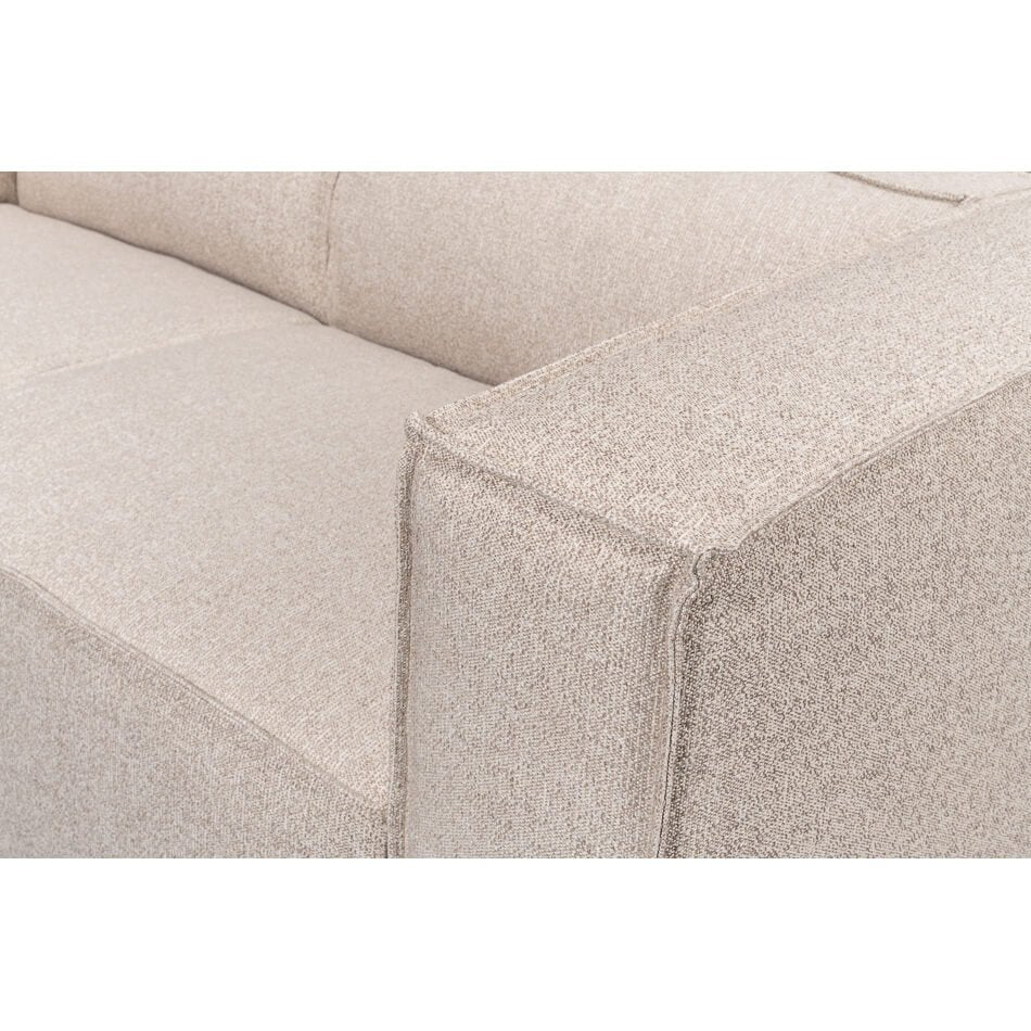 Close-up seat cushion detail of linen sofa.