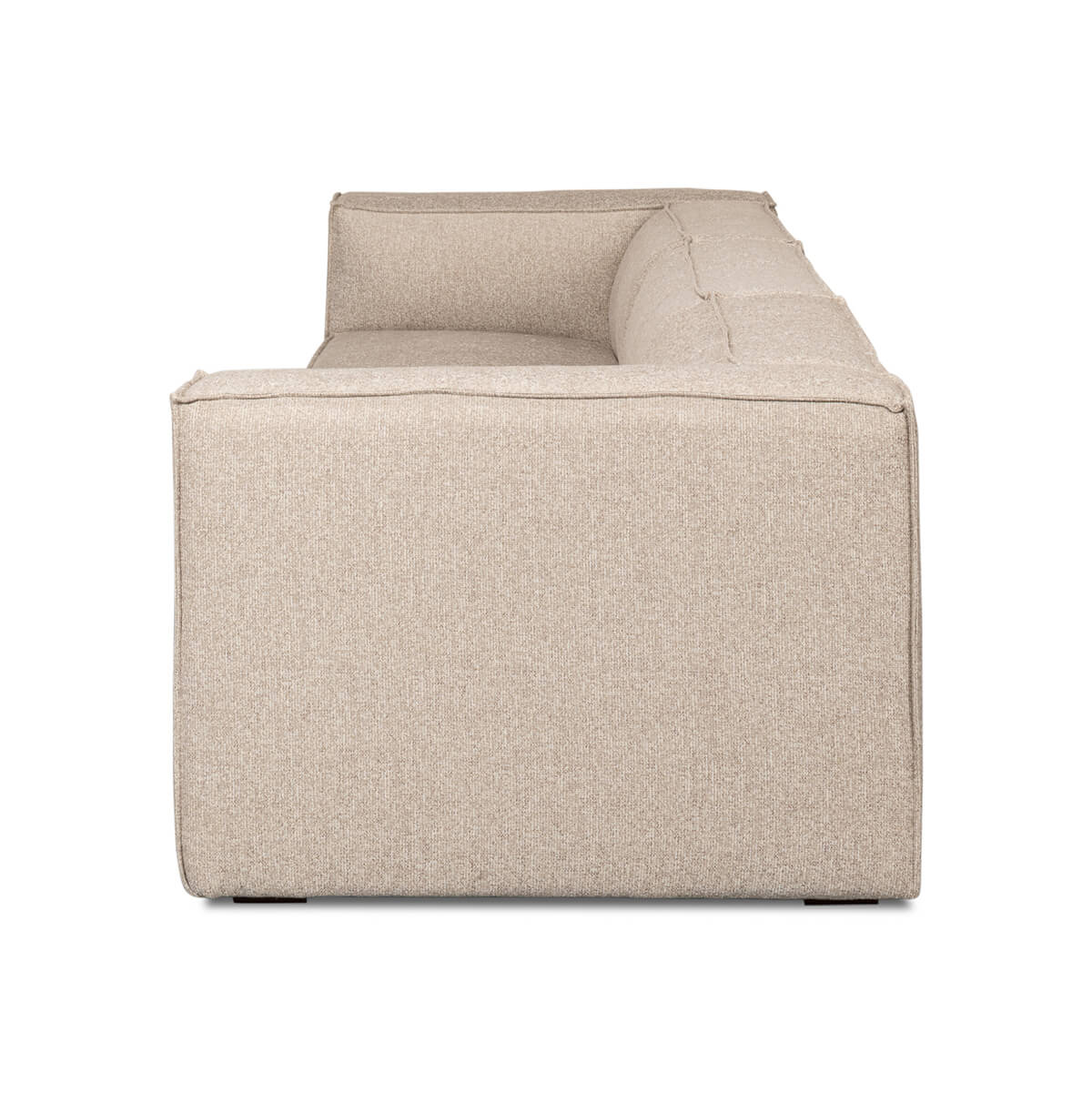 Beige minimalist linen sofa side profile.